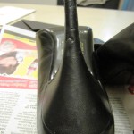 This was the more damaged shoe  - you can see how the leather has almost been scraped off the heel. This was after trying to push the leather flap down with a damp cloth